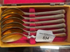 Russian Silver: White metal set of six teaspoons bead pattern handles, gilt bowls, test as silver.