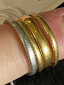 Jewellery: White metal plain 2mm band stamped platinum, tests as such, size L. Weight 3.7g.