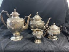 White metal Swiss silver stamped 800 four piece tea set, leaf and bead pattern. Total weight 54.