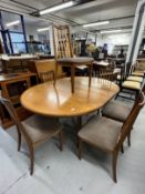 Mid 20th cent. G-Plan teak effect circular table with six chairs (chairs upholstery does not conform