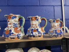 20th cent. Mason's Ironstone: Imari dragon handled graduated set of jugs. 9ins, 8ins, 6½ins. (3)