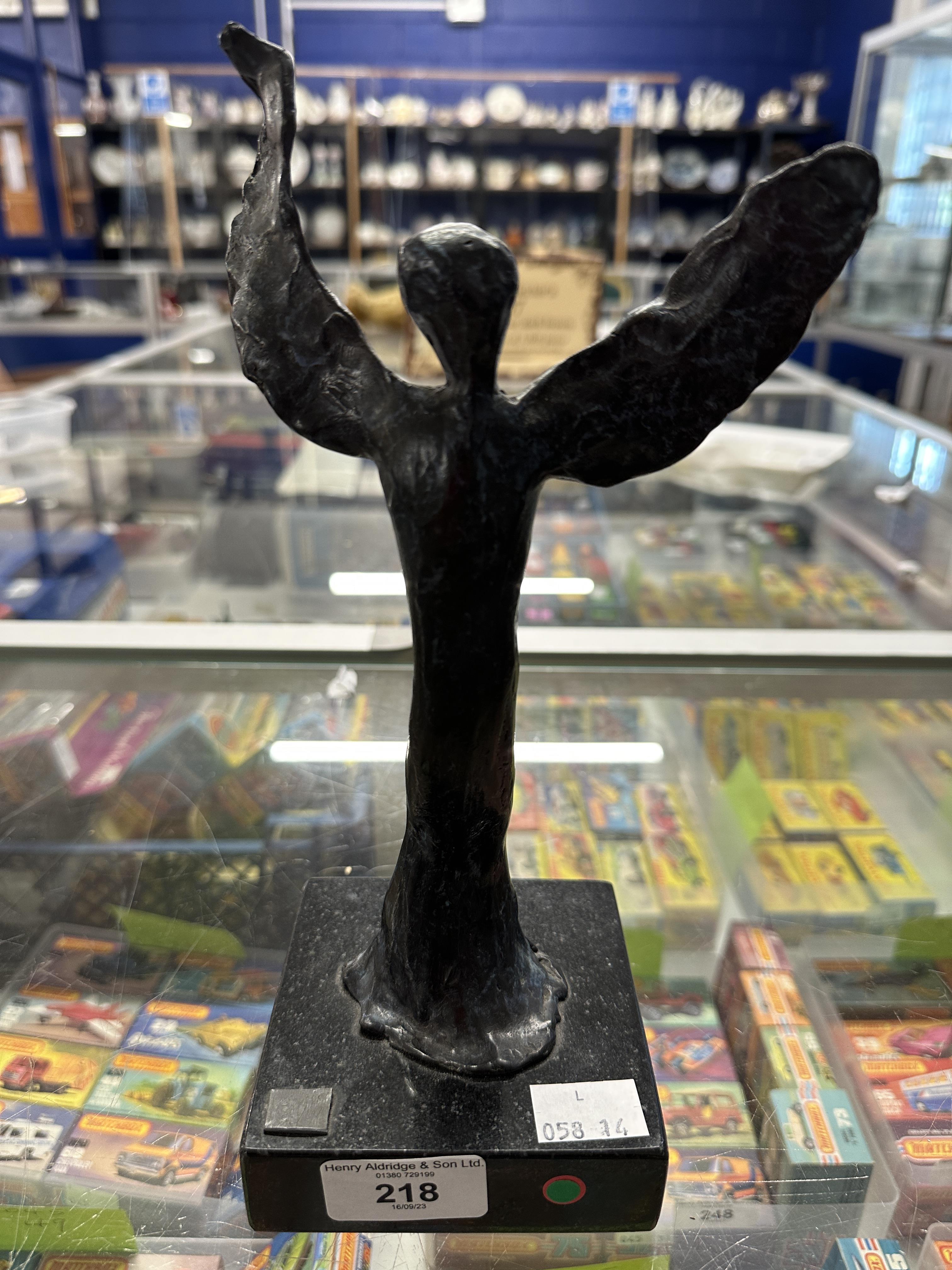 Caroline Stanley, British b. 1948: Bronze Angel Series Hydra on a black marble base with plaque,