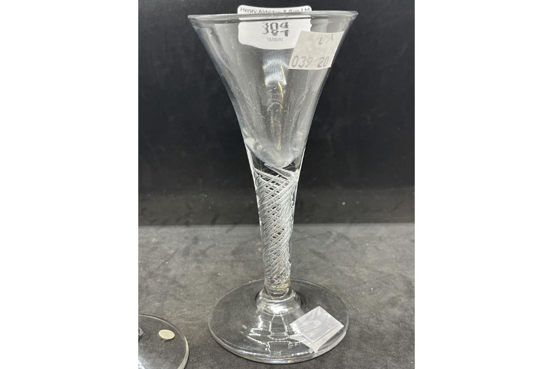 18th cent. Wine glasses drawn trumpet bowls one on a mercury spiral stem, the other air twist - Image 2 of 3