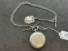 Watches: 19th cent. White metal gentleman's Hunter watch and Albert chain, key movement marked and