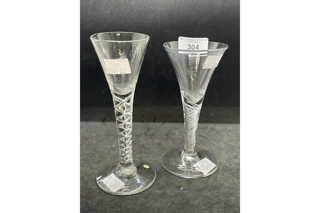 18th cent. Wine glasses drawn trumpet bowls one on a mercury spiral stem, the other air twist - Image 1 of 3