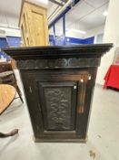 20th cent. Oak corner cupboard, a single door opens to reveal three shaped shelves, the carved
