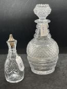 19th cent. Glass: Hob cut ring neck decanter, plus wheel cut condiment bottle.