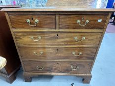 Georgian mahogany two over three chest of drawers of modest proportions on bracket supports with
