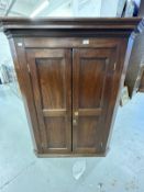 18th cent. Oak peg jointed twin door corner cupboard with original furniture and lock, the doors
