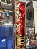1953 Coronation gold coach and horses, unmarked, contained in a red/white/blue striped box.
