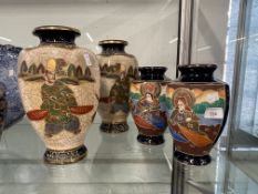 Early 20th cent. Pair of Japanese Satsuma vases, traditional decoration 9ins. (23cms) tall Plus