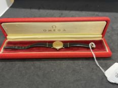 Watches: Ladies Omega de Ville , champagne coloured dial with original leather strap.