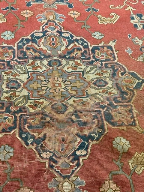 19th cent. Iranian Heriz carpet retailed by Maple & Co London (label attached). Red ground with - Image 5 of 7