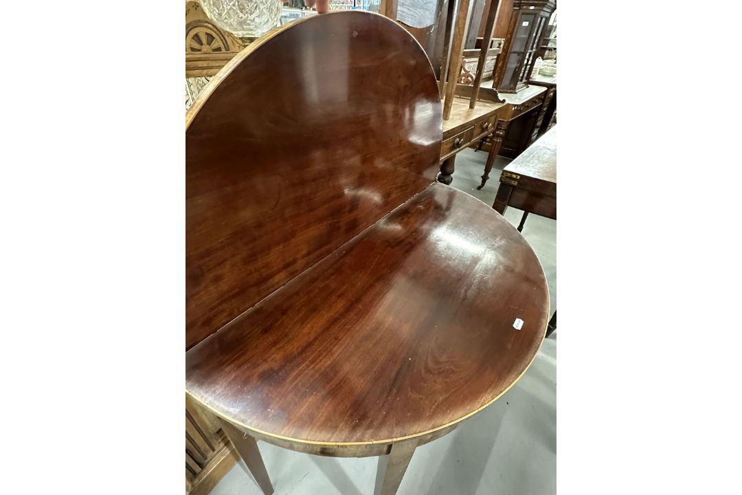 19th cent. Mahogany demi lune tea table inlaid with boxwood stringing, on tapering supports. - Image 2 of 3