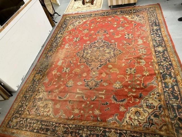 19th cent. Iranian Heriz carpet retailed by Maple & Co London (label attached). Red ground with - Image 2 of 7