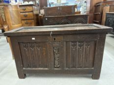 Late 18th cent. Oak Welsh coffer, carved panels to front and sides, integral candlebox.
