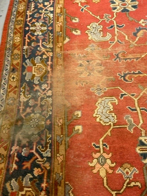 19th cent. Iranian Heriz carpet retailed by Maple & Co London (label attached). Red ground with - Image 4 of 7