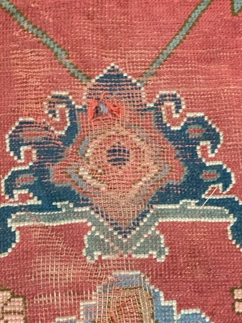 19th cent. Iranian Heriz carpet retailed by Maple & Co London (label attached). Red ground with - Image 6 of 7