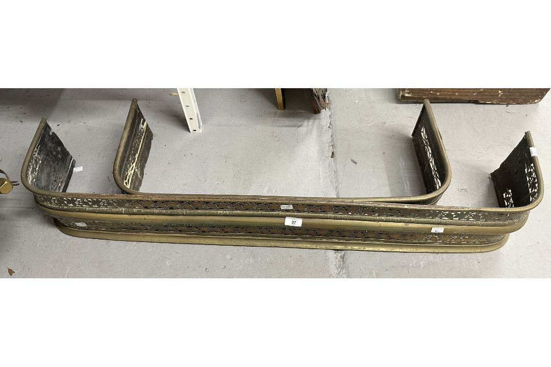 Two brass fire fenders, the larger 47ins. x 7½ins. The smaller 31½ins. x 6ins. Both with - Image 1 of 2