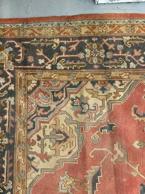 19th cent. Iranian Heriz carpet retailed by Maple & Co London (label attached). Red ground with - Image 3 of 7