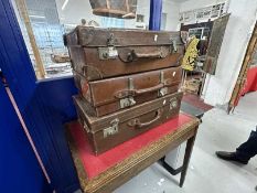 Luggage: Leather suitcases with travel labels