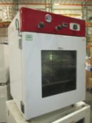 Across Vacuum Oven