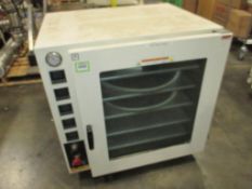 Across Vacuum Oven