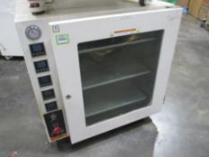 Across Vacuum Oven