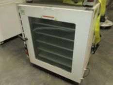 Across Vacuum Oven