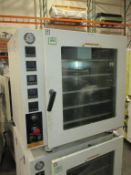 Across Vacuum Oven