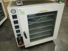 Across Vacuum Oven