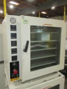 Across Vacuum Oven