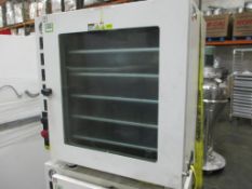 Across Vacuum Oven