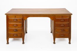 A VINTAGE TEAK TWIN PEDESTAL DESK