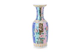 A LARGE MULTI-COLOURED FAMILLE ROSE VASE