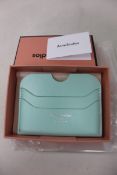 Three boxed as new Acne Studios Leather Card Holders in Pastel Green.