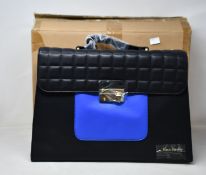 An as new Nova Harley Luxury Athens leather changing bag.