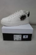 A pair of women's boxed as new Kurt Geiger London Laney Eye Sneakers in white (EU 41).