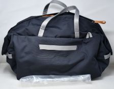 An as new Bellroy Classic Weekender Bag 45L in Slate.