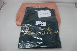 An Acne Studios deep green round neck and gold motif jumper (Size XL).