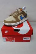 A pair of boxed as new Nike Dunk Low SZ (UK 6).