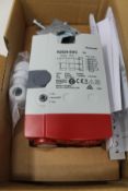 A boxed as new Honeywell SmartAct Damper Actuator, 20Nm, 24Vac, 6VA, IP54 (REF: N2024-SW2).
