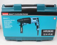 An as new Makita HR2630 Combination Hammer 26mm.