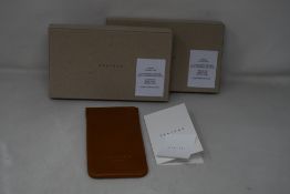 Two as new TSATSAS David Chipperfield Glasses Case in Tan/Gold.