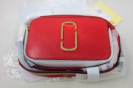 An as new Marc Jacobs The Snapshot true red multi leather camera bag.