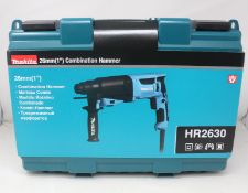 An as new Makita HR2630 Combination Hammer 26mm.