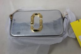 An as new Marc Jacobs The Specchio SnapShot silver bag.
