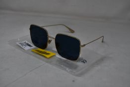 An as new pair of Christian Dior Stellaire1Xs Blue Lens Sunglasses with Gold Frame (EAN: