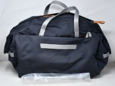 An as new Bellroy Classic Weekender Bag 45L in Slate.