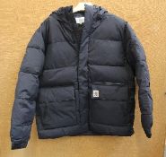 An as new Carhartt Munro Jacket in Black (Size XL).